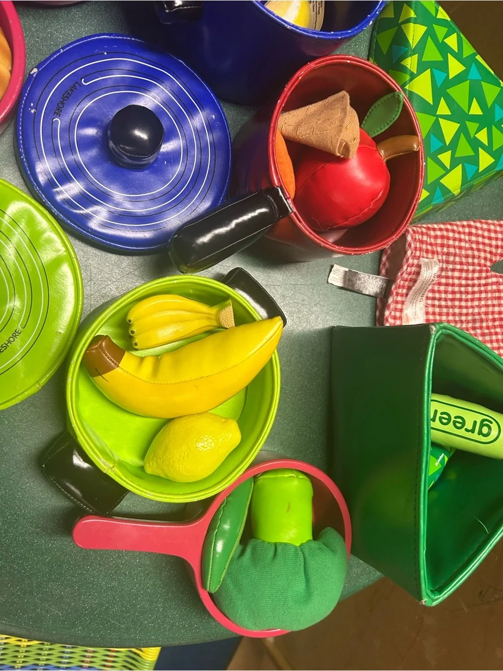 Kitchen play- colorful pans, food and wooden mixer